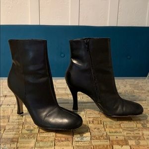 REAL leather. Worn once inside.